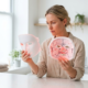 Woman comparing two red light therapy LED masks side by side